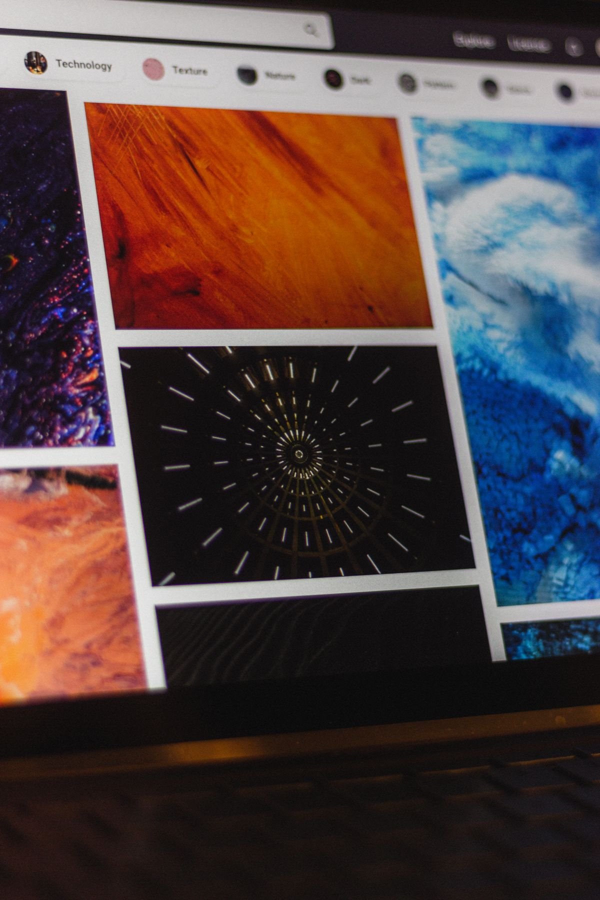 Laptop screen showing a photo gallery website mockup
